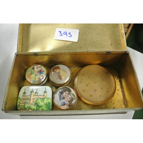 395 - A large collection of various items to include cigarette and cigar boxs, vintage tins, coins and mor... 