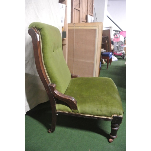 410 - A stunning antique library chair on casters