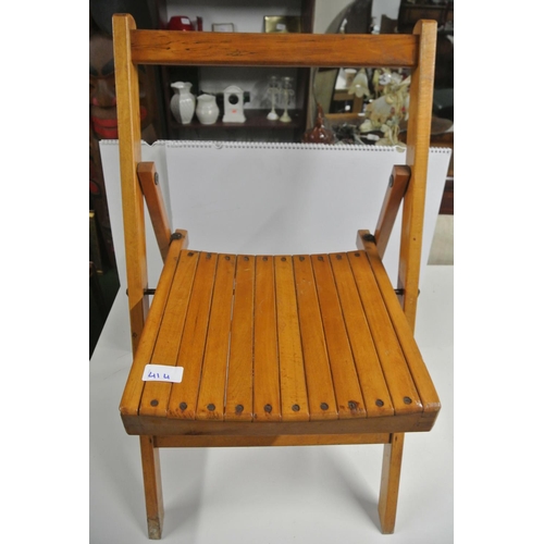 414 - A vintage folding wooden chair