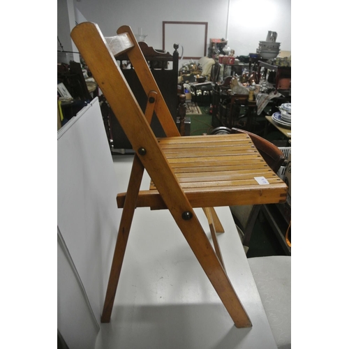 414 - A vintage folding wooden chair