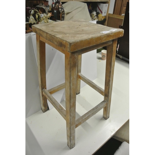 425 - An antique wooden rustic stool