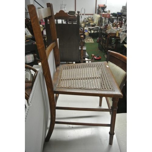 438 - An antique chair with woven seat