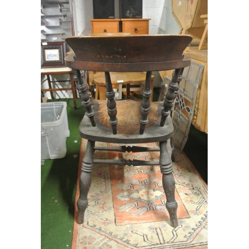 449 - An antique captain's / smoker's chair