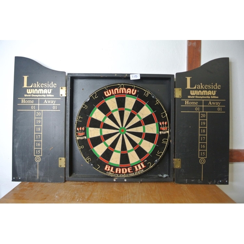 115 - A Lakeside Winmau dartboard in case.