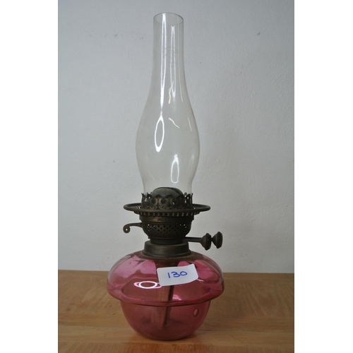 130 - A pink glass oil lamp