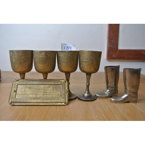 139 - Four brass goblets, a pair of silver plated riding boots and a brass stationery holder Exhibition of... 