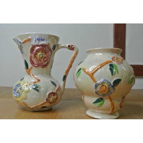 146 - A vintage Arthur Wood handled jug and matching vase