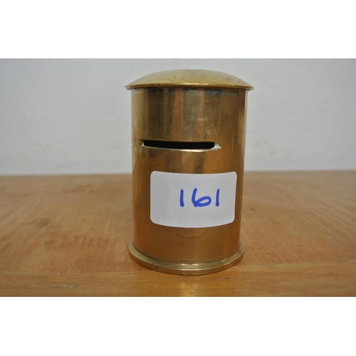 161 - A trench art brass money box, made from a shell case