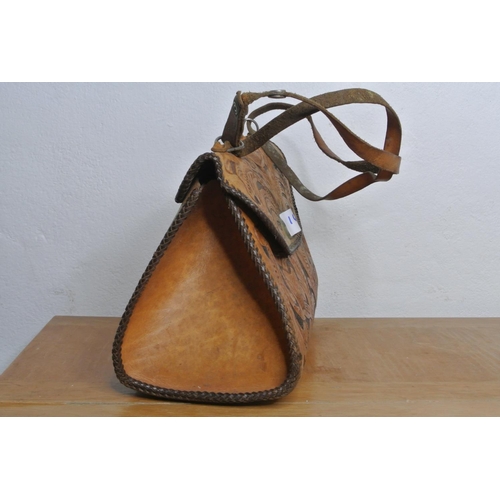 165 - A decorative leather handbag