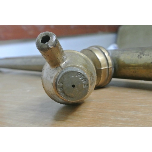 169 - `A vintage brass pump.