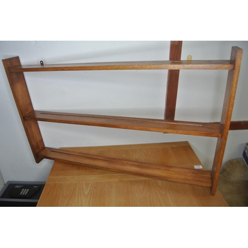 174 - A three shelf plate rack