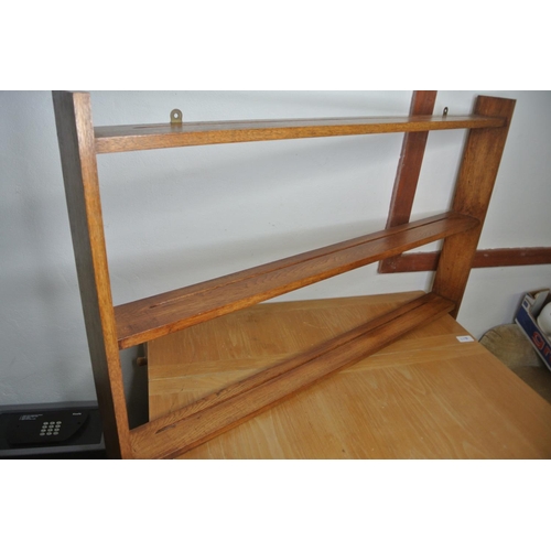 174 - A three shelf plate rack