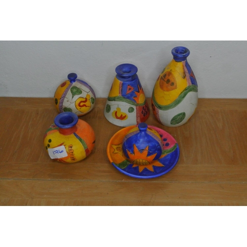 176 - A lot of various brightly coloured handcrafted pottery