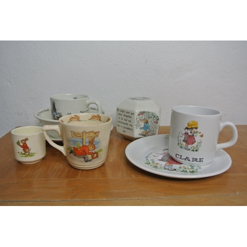 177 - A lot of children's pottery pieces including Wedgwood Peter Rabbit, Royal Doulton Bunnykins and Purb... 