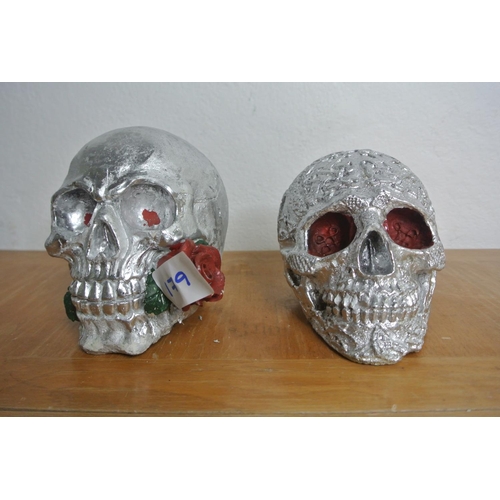 179 - Two gothic skulls