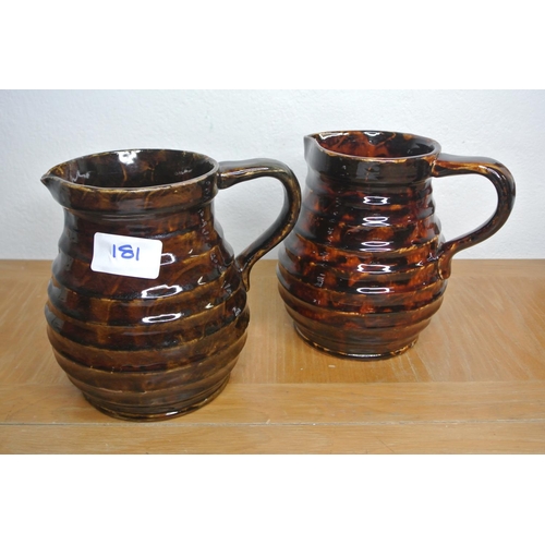 181 - A pair of water jugs