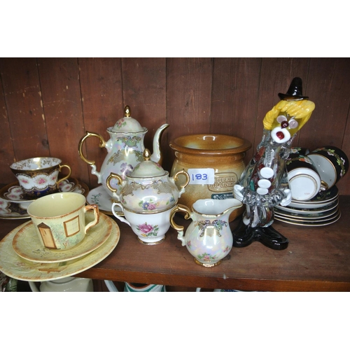 183 - A job lot to include part teasets, glass clown etc