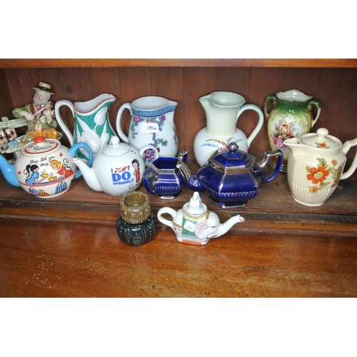 186 - The complete shelf of collectables including teapots, vases etc