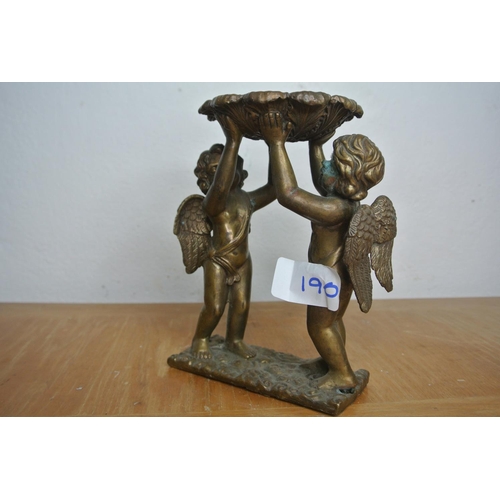 190 - A brass Cherub candle holder a/f