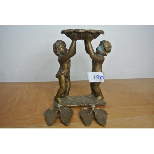 190 - A brass Cherub candle holder a/f