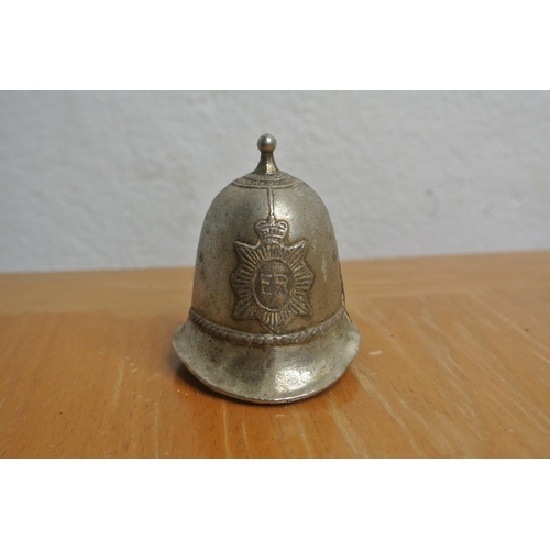 195 - A vintage silver plated Policeman's helmet.