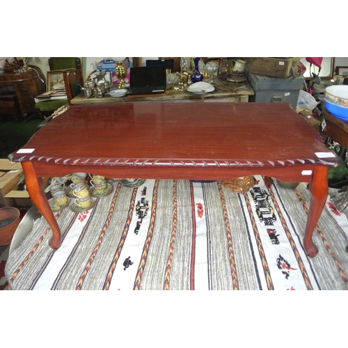 201 - A mahogany coffee table