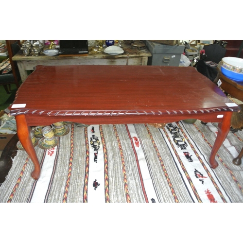 201 - A mahogany coffee table