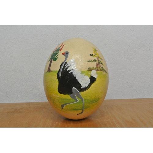 203 - A hand painted Ostrich egg