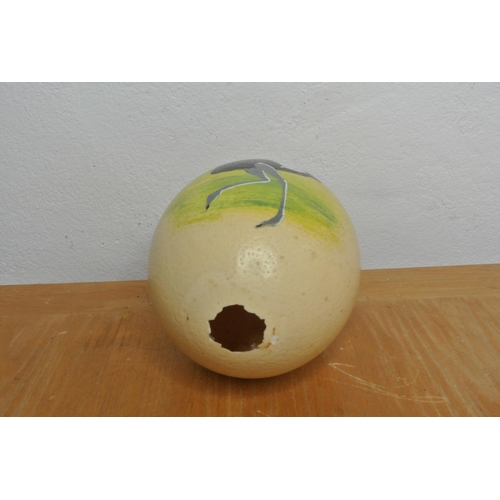 203 - A hand painted Ostrich egg