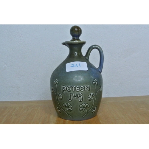 211 - A Wade Irish porcelain poteen jug