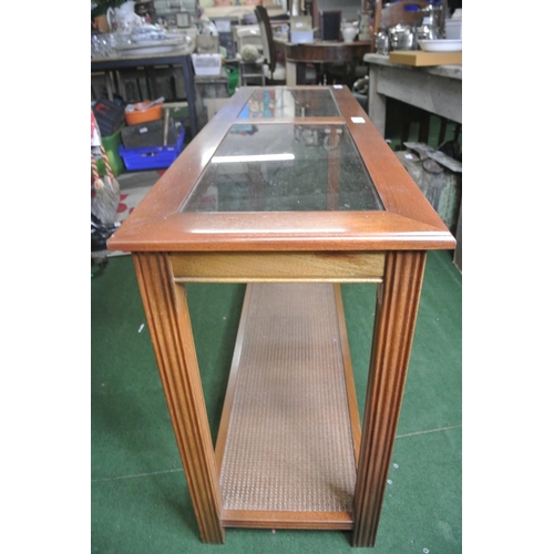 217 - A modern slimline glass topped table