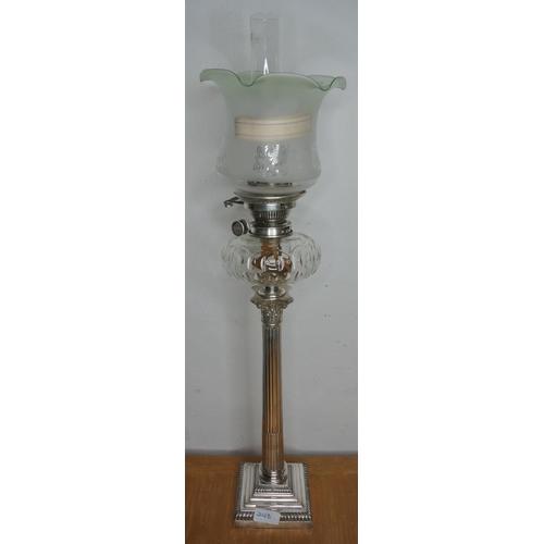 243 - A superb tall silver plated oil lamp and etched green shade, produced by Hawksworth Eyre & Co