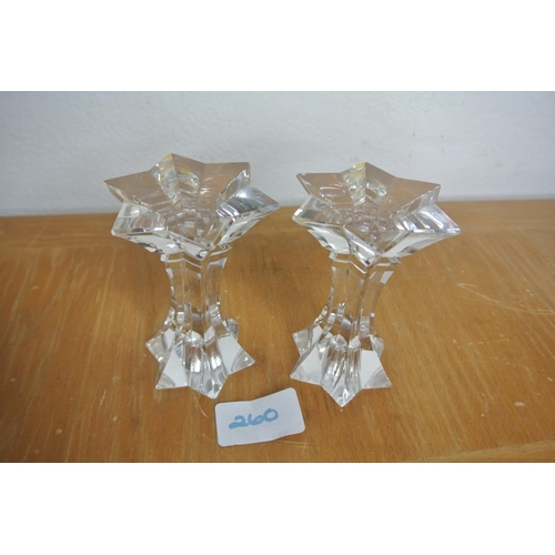 260 - A pair of glass candlesticks