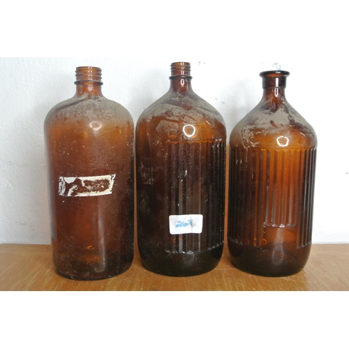 267 - 3 large vintage chemist bottles.