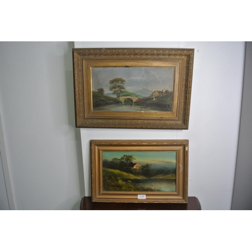 28 - A heavy gilt framed oil painting and another similar painting