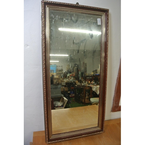 288 - A retro mirror with decorative details produced by Consort Pictures Northern Ireland.