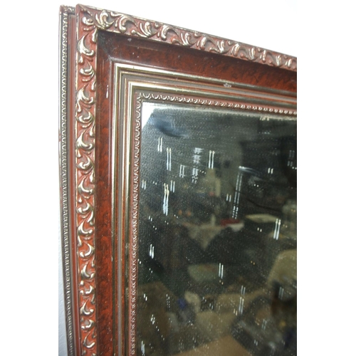 288 - A retro mirror with decorative details produced by Consort Pictures Northern Ireland.