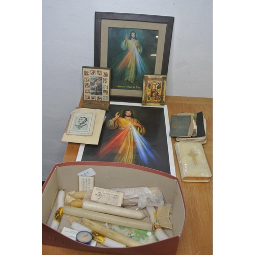 289 - A collection of religious items to include bibles, prints and more