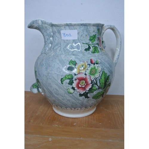 302 - An antique hand painted jug