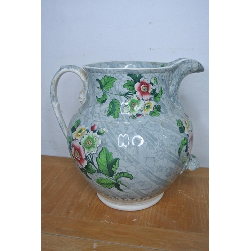 302 - An antique hand painted jug