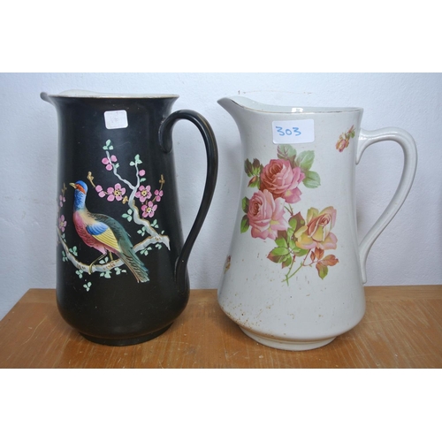 303 - Two antique hand painted jugs