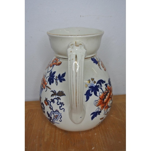 304 - An antique hand painted jug produced by Wallis Gimson and co