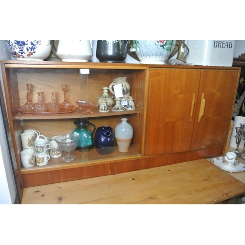 305 - A vintage sideboard / book case with sliding glass doors