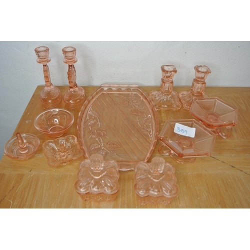 309 - A vintage pink pressed glass dressing table vanity set.