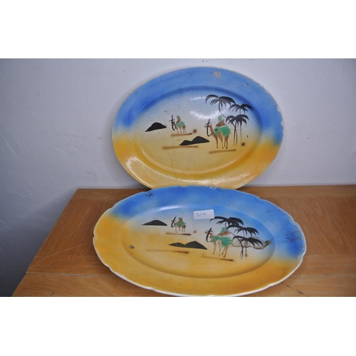 317 - A pair of antique hand painted platters produced by W.H.Grindley and Co Ltd