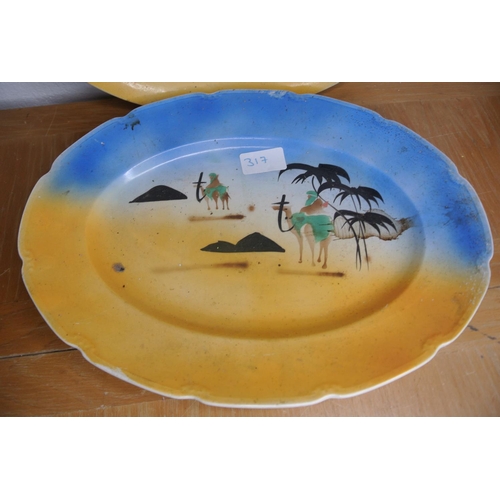 317 - A pair of antique hand painted platters produced by W.H.Grindley and Co Ltd