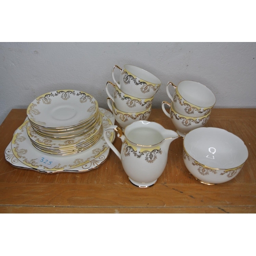 325 - A collection of tea cups, saucers etc produced by Royal Grafton