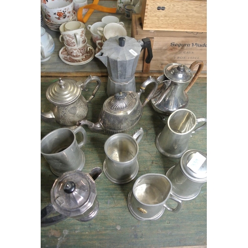 339 - A collection of silver plated and pewter items to include tankards, coffee pots and more