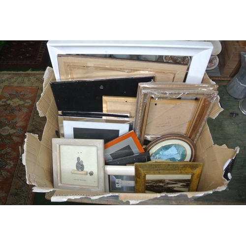 346 - A large collection of photo frames and prints