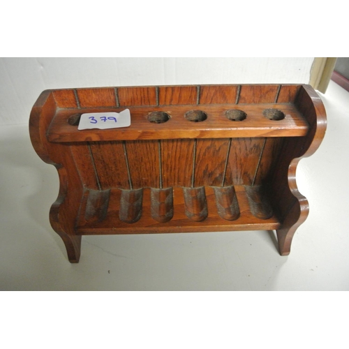 379 - A vintage pipe rack